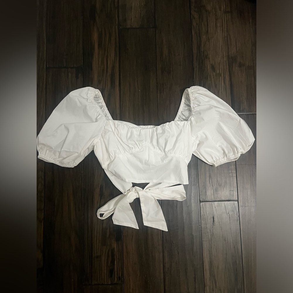 White crop shirt. I think from vestique- small! I wore in my bachelorette trip